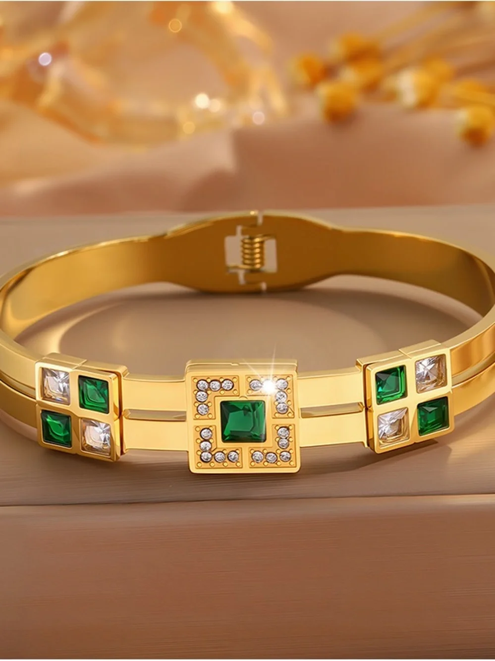 Gold-Tone Bracelet with Emerald Green and Clear Stones
